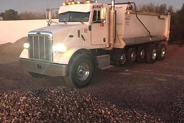 Rocks4Less-Truck Hauling Rock